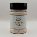 A jar of Habanero Salt from BA Family Farms, featuring a white label with orange text and a black lid, set against a plain light gray background.